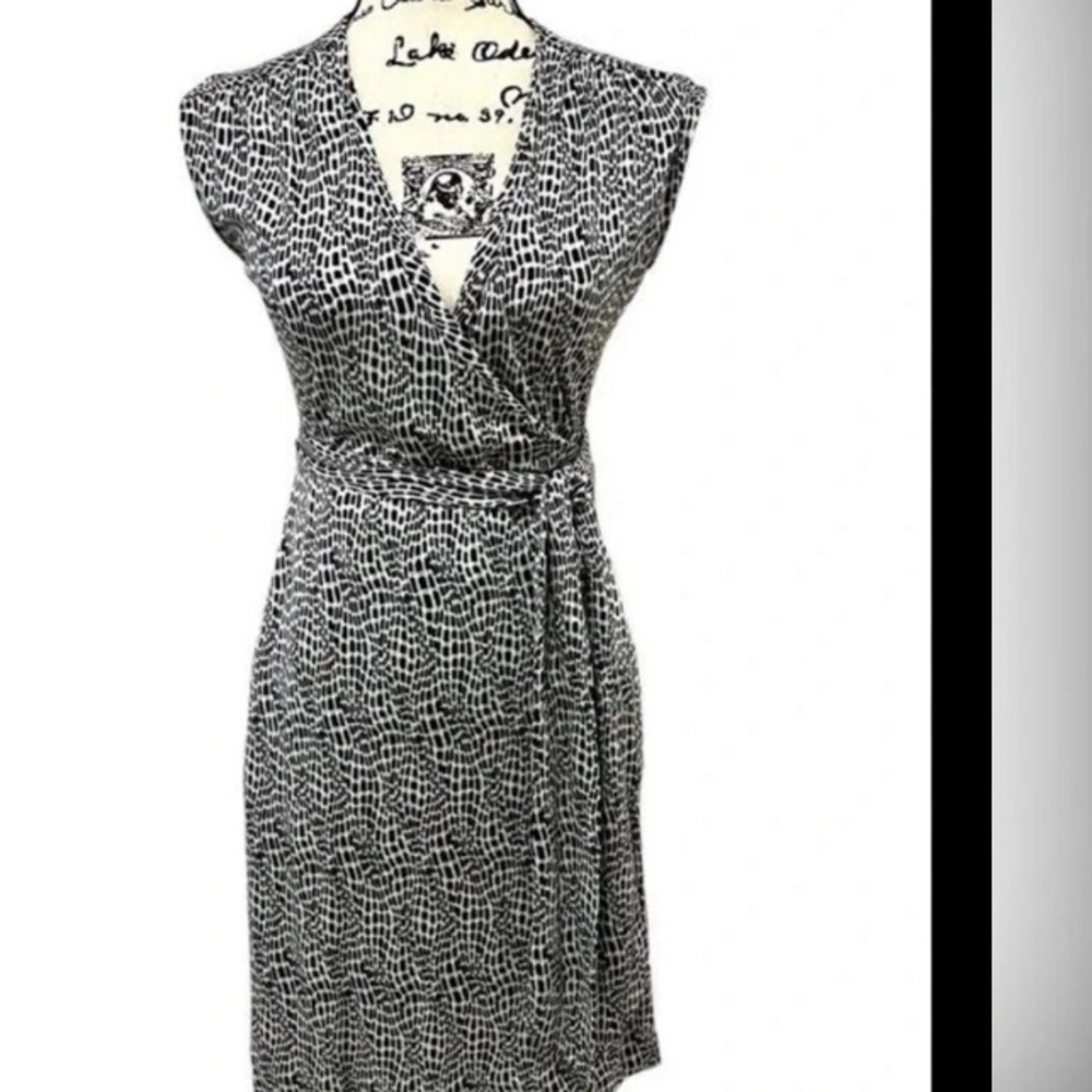 Tory Burch Elegant Black and White Wrap Dress in great used condition.